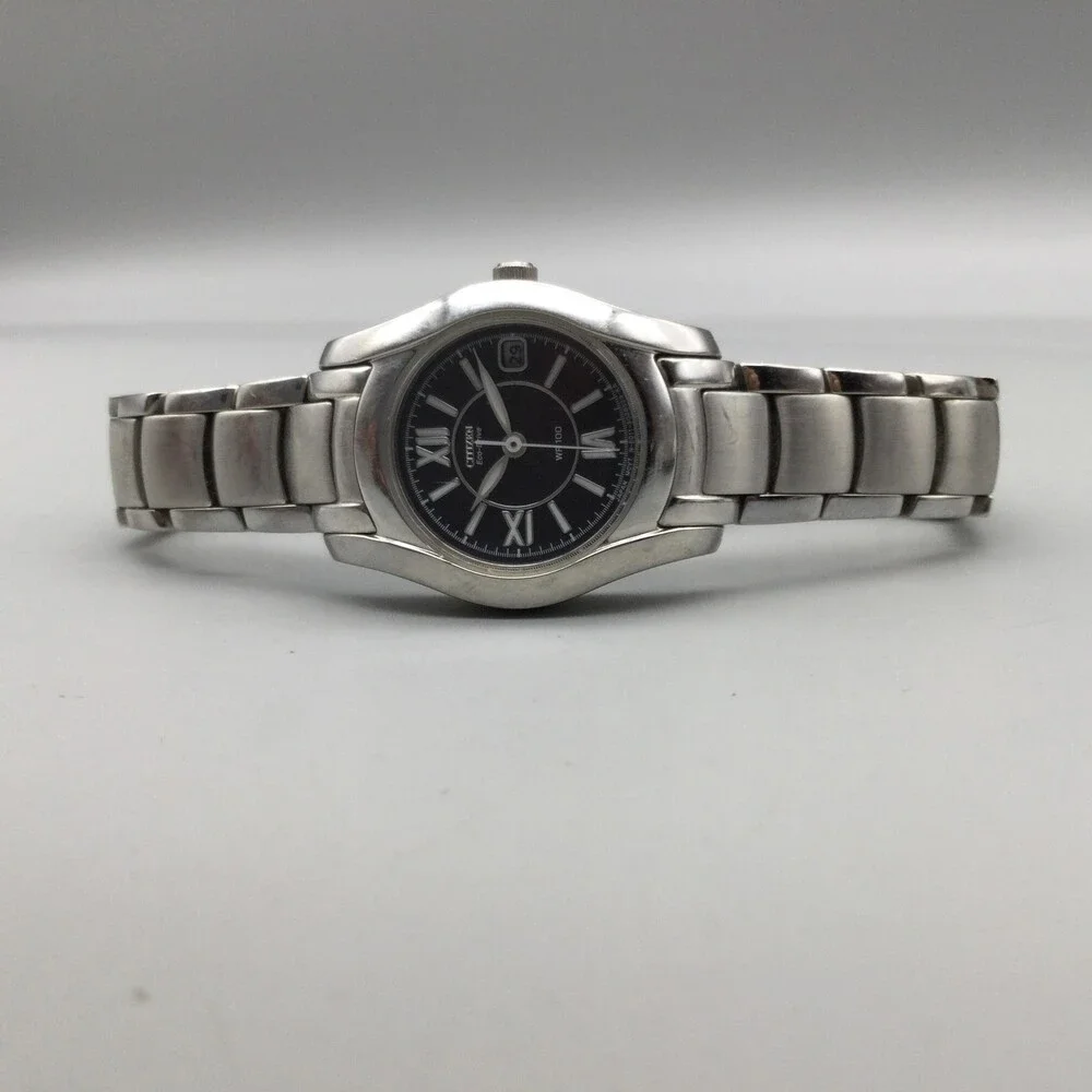 Citizen Eco-Drive WR 100 Womens Watch 25mm Black Dial Date Stainless Bracelet 6